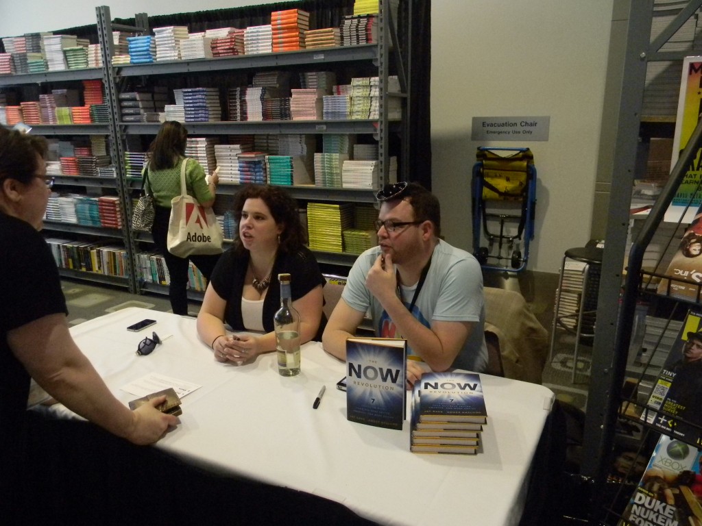 Amber Naslund and Jay Baer at SXSW book signing for The Now Revolution talking to Leigh Durst